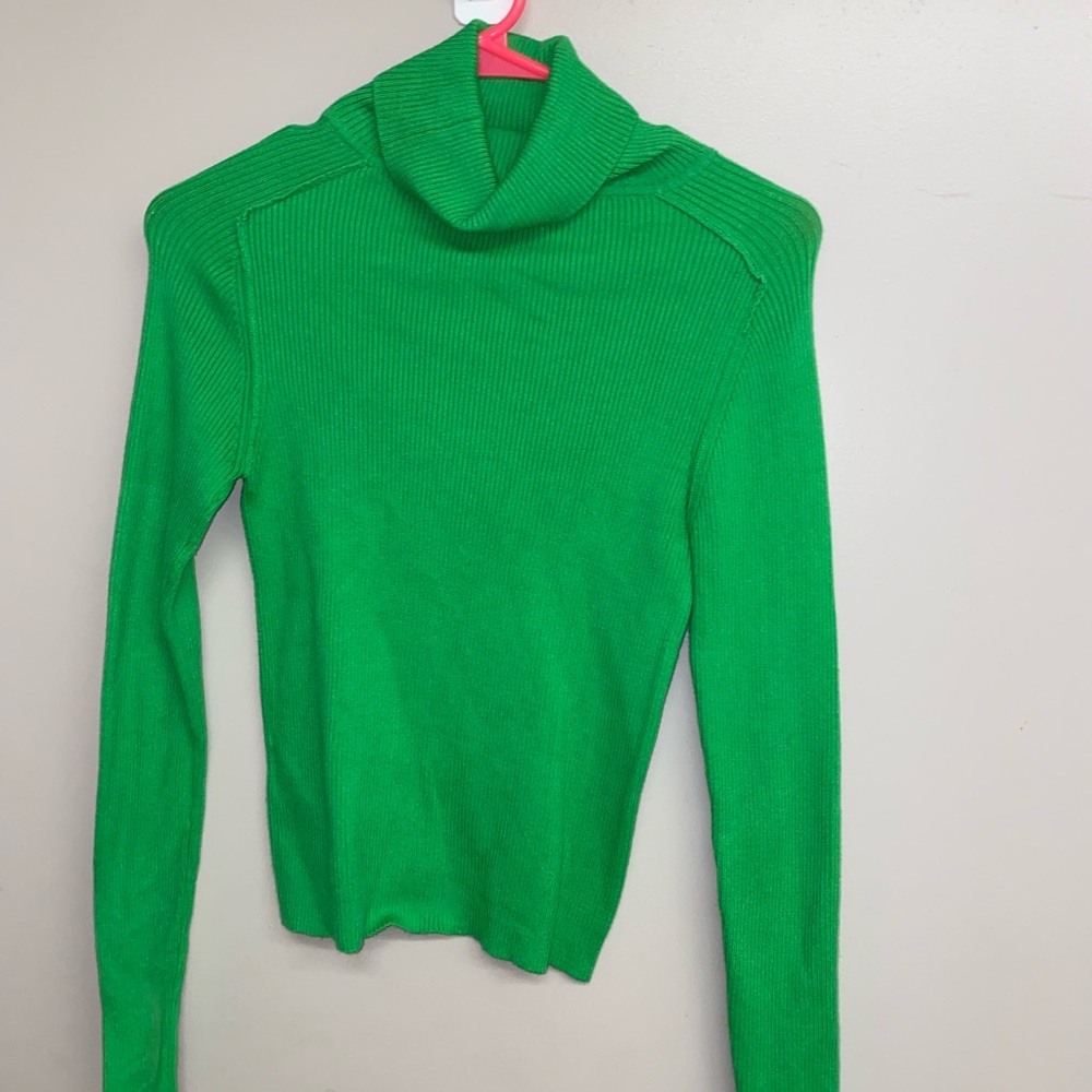 Green ribbed turtleneck sweater